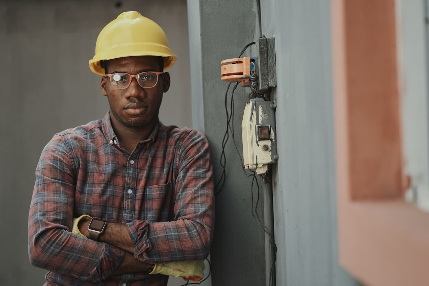 Utility worker in a hard hat on a job site